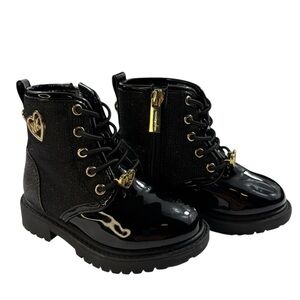 Michael Kors Haskellheart Faux Patent Leather boots with gold-tone heart logo.